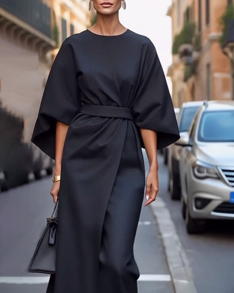 Nada jurk met elegante lampas mouwen en riem