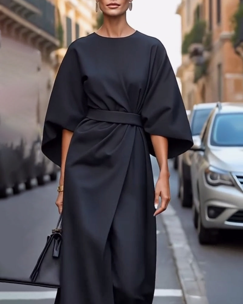 Nada jurk met elegante lampas mouwen en riem