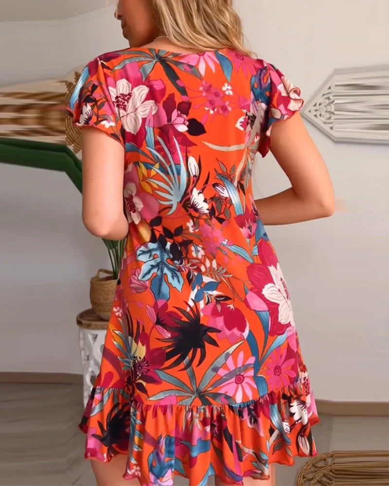 Bloemenjurk met V-hals en volants